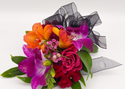 Bright and Bold Homecoming Corsage by 6th & Foster